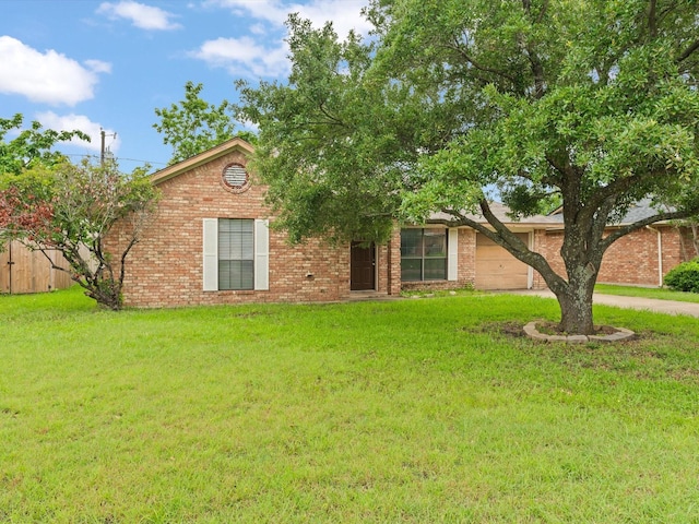 713 Brookhaven Dr, Royse City, TX 75189 - view of front of home with an attached garage, brick siding, and concrete driveway