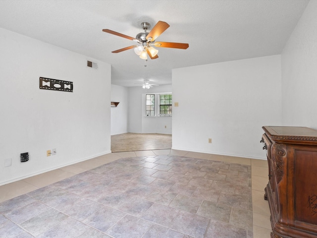 713 Brookhaven Dr, Royse City, TX 75189 - unfurnished room featuring a ceiling fan and baseboards