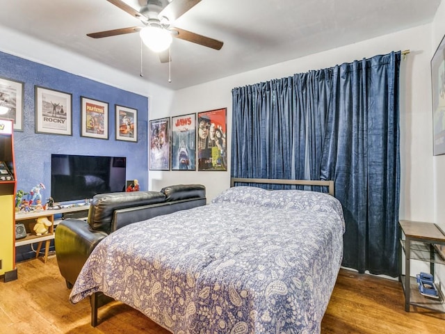 417 Merriman Dr, Highland Village, TX 75077 - bedroom with wood finished floors and a ceiling fan