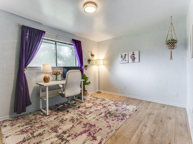 417 Merriman Dr, Highland Village, TX 75077 - home office with wood finished floors and baseboards