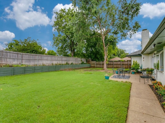 417 Merriman Dr, Highland Village, TX 75077 - fenced backyard with a patio
