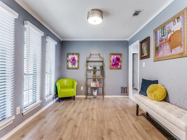 417 Merriman Dr, Highland Village, TX 75077 - living area featuring ornamental molding and wood finished floors
