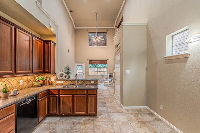 2268 Fletcher Trl, Plano, TX 75025 - kitchen featuring dishwasher, a ceiling fan, tasteful backsplash, a high ceiling, and a peninsula