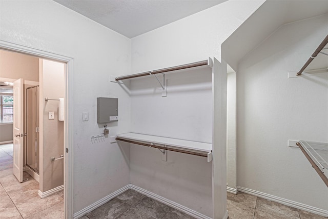 2268 Fletcher Trl, Plano, TX 75025 - spacious closet featuring light tile patterned flooring