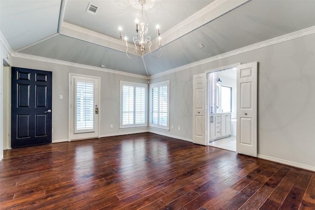 6404 Camille Ave, Dallas, TX 75252 - foyer entrance featuring a chandelier, plenty of natural light, wood-type flooring, a raised ceiling, and ornamental molding