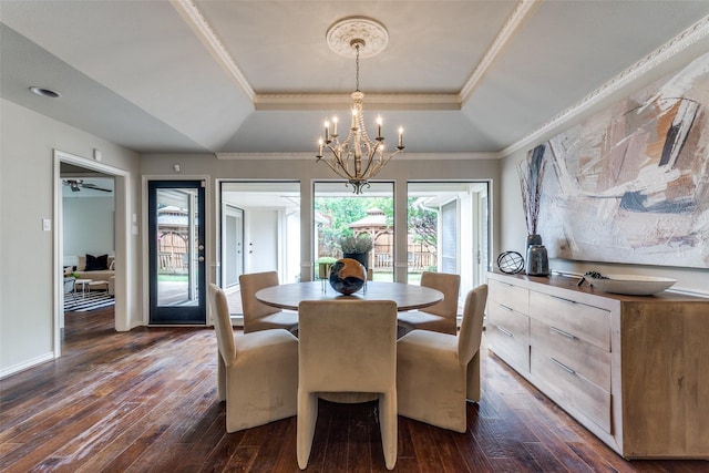 6404 Camille Ave, Dallas, TX 75252 - dining space with a tray ceiling, dark wood-style floors, a chandelier, and ornamental molding