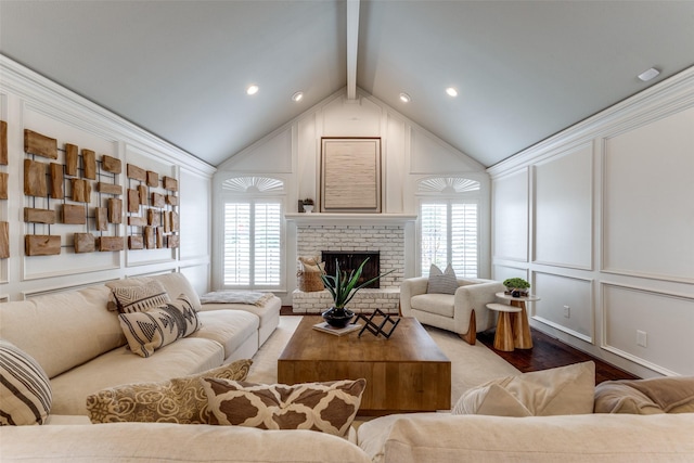 6404 Camille Ave, Dallas, TX 75252 - living area with a decorative wall, wood finished floors, a fireplace, and recessed lighting