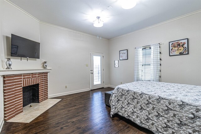 825 W 12th St, Dallas, TX 75208 - bedroom with dark wood-type flooring, ornamental molding, a fireplace, and access to outside