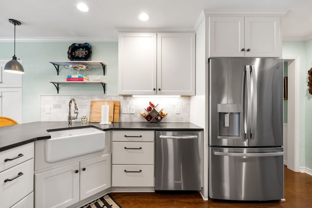 7120 Leameadow Dr, Dallas, TX 75248 - kitchen with appliances with stainless steel finishes, open shelves, dark countertops, ornamental molding, and tasteful backsplash