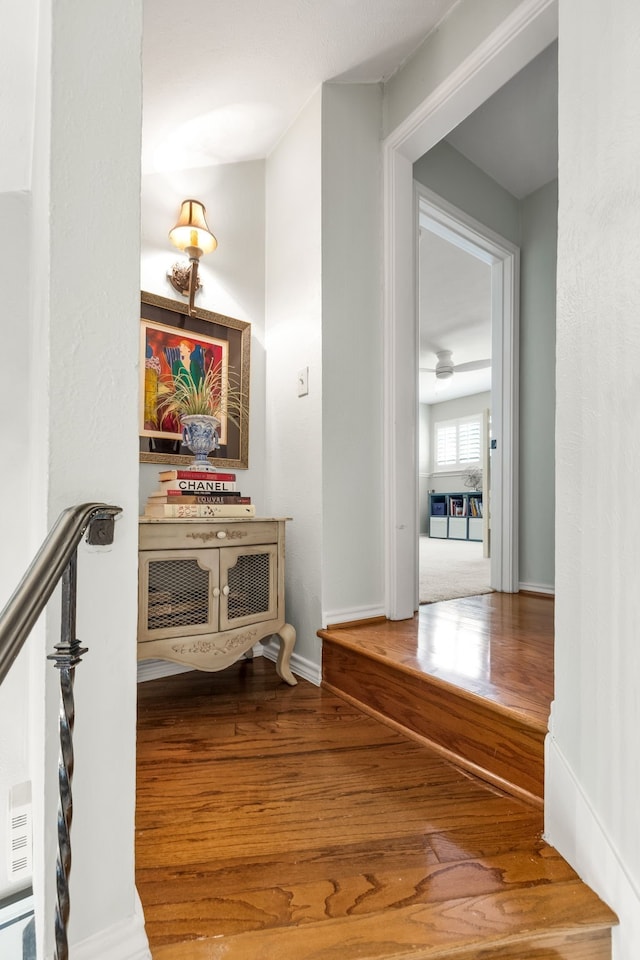 7120 Leameadow Dr, Dallas, TX 75248 - corridor featuring wood finished floors and baseboards