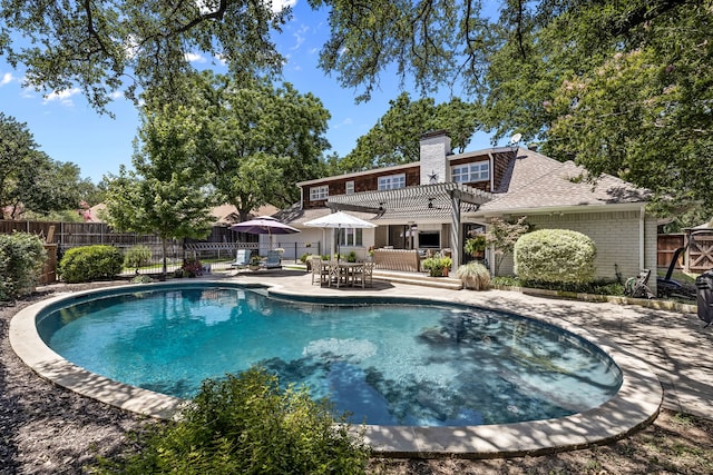 7120 Leameadow Dr, Dallas, TX 75248 - view of pool with a pergola, a patio area, and outdoor dining area