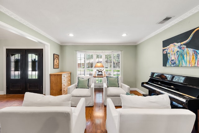 7120 Leameadow Dr, Dallas, TX 75248 - living area featuring wood finished floors, crown molding, and recessed lighting