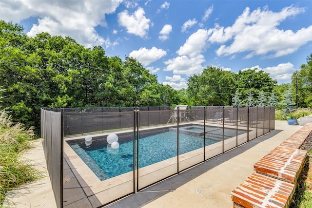 137 White Dove Trl, Denison, TX 75020 - view of pool with a pool with connected hot tub, a patio area, and view of scattered trees