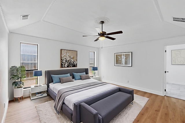 2258 Valley, Carrollton, TX 75006 - bedroom featuring light wood-type flooring, vaulted ceiling, and a ceiling fan