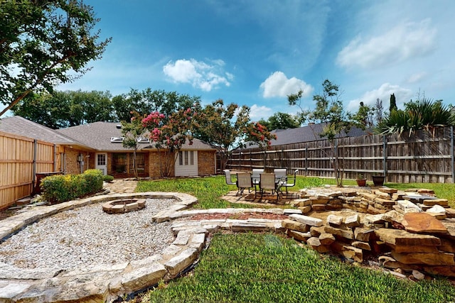 2258 Valley, Carrollton, TX 75006 - view of yard featuring a fire pit and a patio