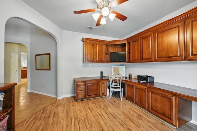 14049 Wrangler Way, Haslet, TX 76052 - office space with built in desk, a ceiling fan, and arched walkways