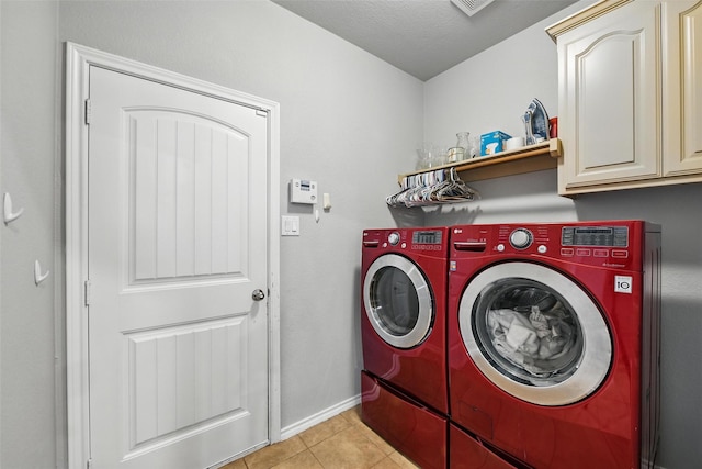 14049 Wrangler Way, Haslet, TX 76052 - laundry area with washing machine and dryer, light tile patterned floors, and cabinet space