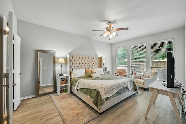 14049 Wrangler Way, Haslet, TX 76052 - bedroom featuring light wood-type flooring and a ceiling fan
