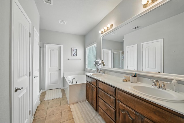 14049 Wrangler Way, Haslet, TX 76052 - full bathroom featuring double vanity, a bath, tile patterned flooring, and a shower stall