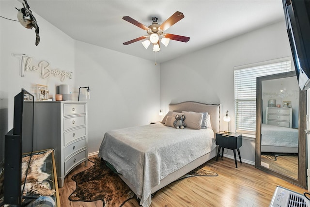 14049 Wrangler Way, Haslet, TX 76052 - bedroom with light wood-style floors and ceiling fan
