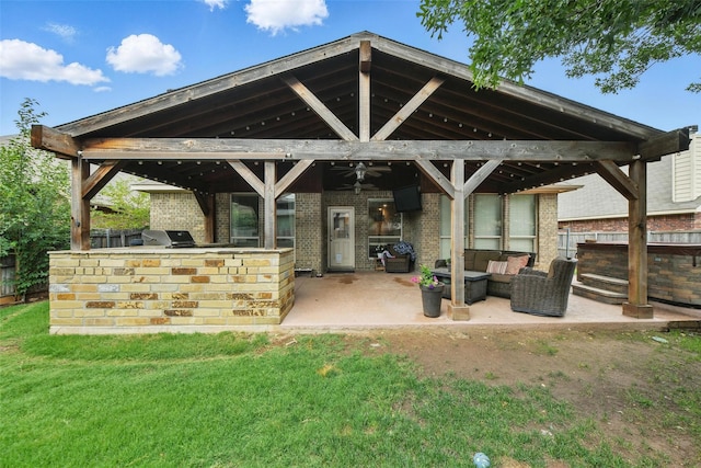 14049 Wrangler Way, Haslet, TX 76052 - view of patio with area for grilling, a gazebo, ceiling fan, and outdoor lounge area