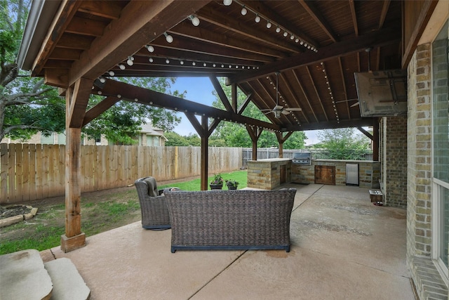 14049 Wrangler Way, Haslet, TX 76052 - fenced backyard featuring a gazebo, an outdoor kitchen, ceiling fan, and a patio area