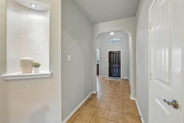 14049 Wrangler Way, Haslet, TX 76052 - foyer with arched walkways and light tile patterned floors
