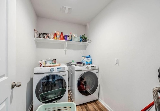 421 Atmore St, Azle, TX 76020 - laundry room with separate washer and dryer and wood finished floors