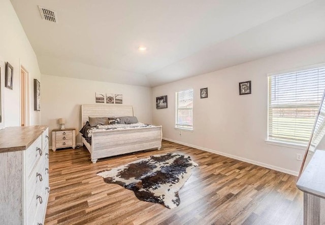 421 Atmore St, Azle, TX 76020 - bedroom with wood finished floors and baseboards