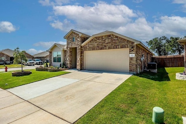 421 Atmore St, Azle, TX 76020 - view of front of property featuring a garage, concrete driveway, and brick siding