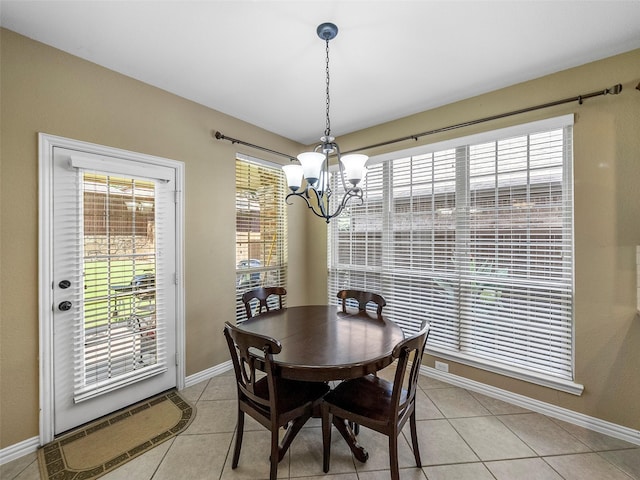 7804 Rocky Mountain Ln, Mckinney, TX 75070 - dining space with a chandelier and light tile patterned flooring