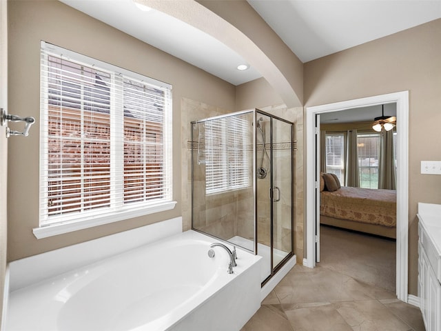 7804 Rocky Mountain Ln, Mckinney, TX 75070 - full bathroom with ensuite bathroom, a garden tub, and a stall shower