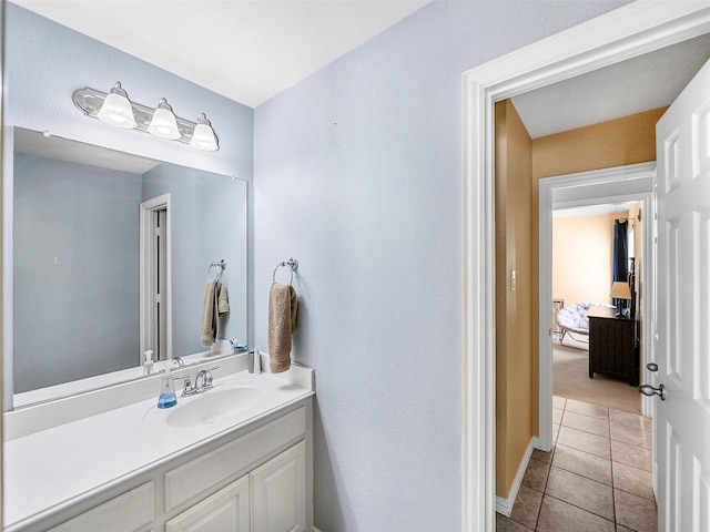 7804 Rocky Mountain Ln, Mckinney, TX 75070 - bathroom featuring tile patterned floors and vanity