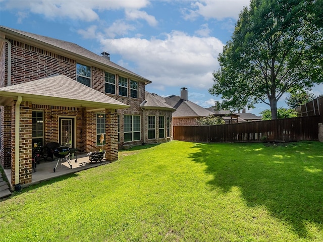 7804 Rocky Mountain Ln, Mckinney, TX 75070 - back of house with brick siding, a patio, and a shingled roof