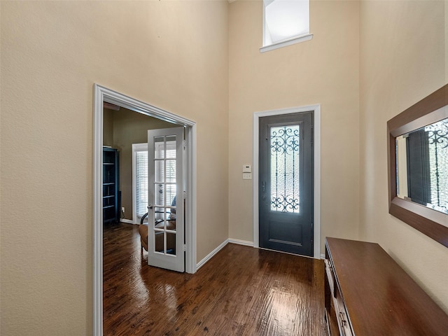 7804 Rocky Mountain Ln, Mckinney, TX 75070 - foyer with dark wood finished floors and a high ceiling