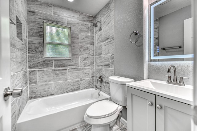 1112 Leyenda Dr, Mesquite, TX 75149 - full bathroom featuring tub / shower combination, vanity, and a textured wall