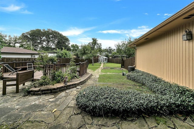 2425 Northgate Dr W, Irving, TX 75062 - fenced backyard with a shed and a deck
