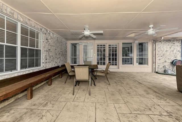 2425 Northgate Dr W, Irving, TX 75062 - view of patio with ceiling fan, outdoor dining space, and french doors