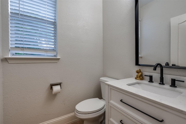 1404 Settlers Ct, Allen, TX 75002 - half bathroom with vanity and toilet