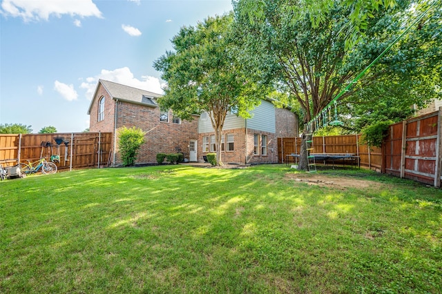 1404 Settlers Ct, Allen, TX 75002 - fenced backyard with a trampoline