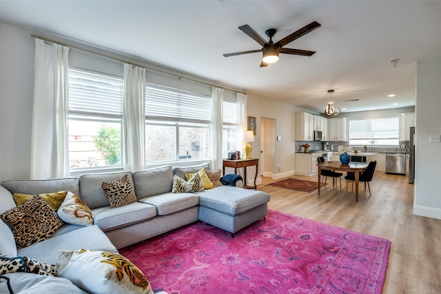 1404 Settlers Ct, Allen, TX 75002 - living room with a ceiling fan, light wood-style floors, and recessed lighting