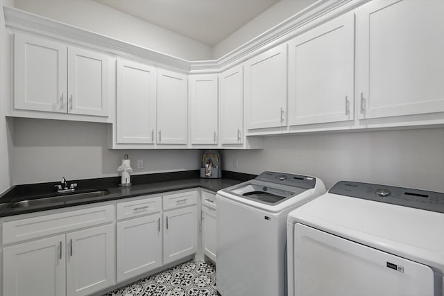 1208 S Pecan Pkwy, Northlake, TX 76247 - washroom with washing machine and dryer and cabinet space