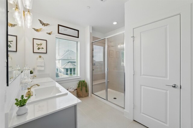 1078 Maverick Dr, Allen, TX 75013 - bathroom featuring double vanity, a shower stall, tile patterned flooring, and recessed lighting