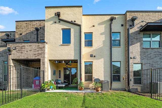 1078 Maverick Dr, Allen, TX 75013 - back of property with a patio, brick siding, and a ceiling fan