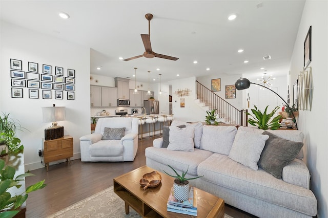 1078 Maverick Dr, Allen, TX 75013 - living area featuring recessed lighting, stairs, light wood-style floors, ceiling fan, and a chandelier