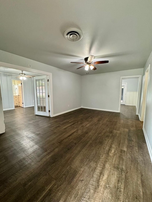 701 N Joyce St, Waco, TX 76705 - unfurnished living room with a ceiling fan and dark wood finished floors