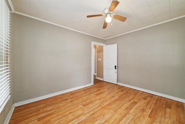 701 S Austin St, De Leon, TX 76444 - unfurnished room with wood finished floors, crown molding, and a ceiling fan