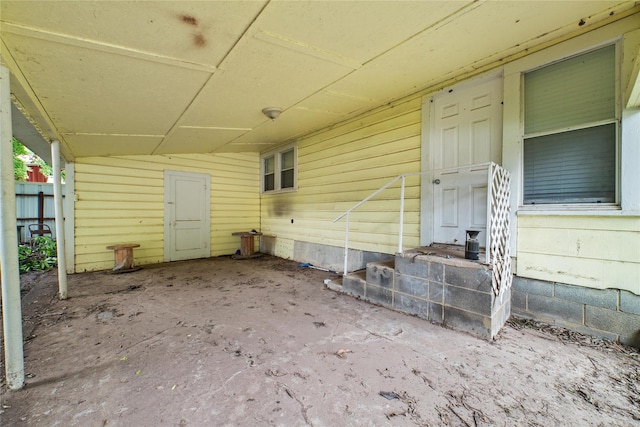 701 S Austin St, De Leon, TX 76444 - view of patio with a carport