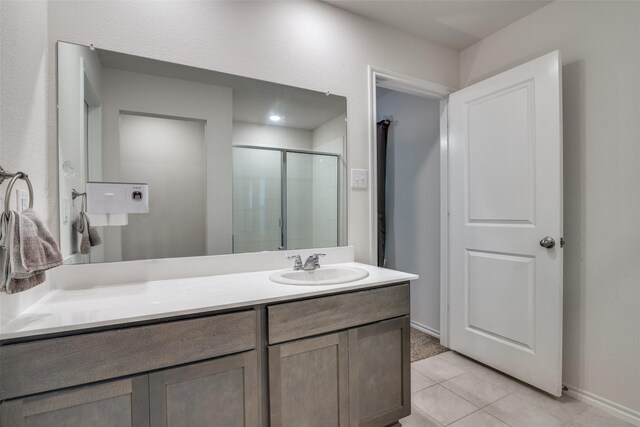 706 Meadow Creek Ln, Josephine, TX 75189 - full bath with vanity, tile patterned floors, and a shower stall