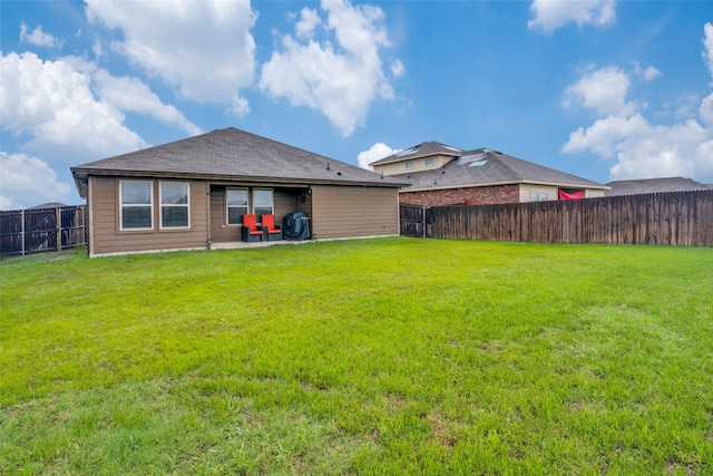 706 Meadow Creek Ln, Josephine, TX 75189 - rear view of property featuring a fenced backyard, a patio, and roof with shingles